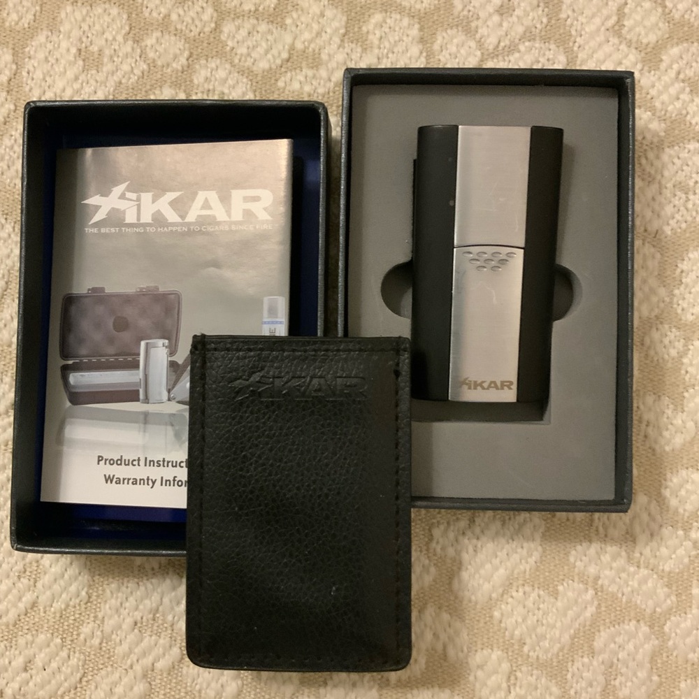 Xikar Black and Silver Torch Lighter w/leather case & original box/papers